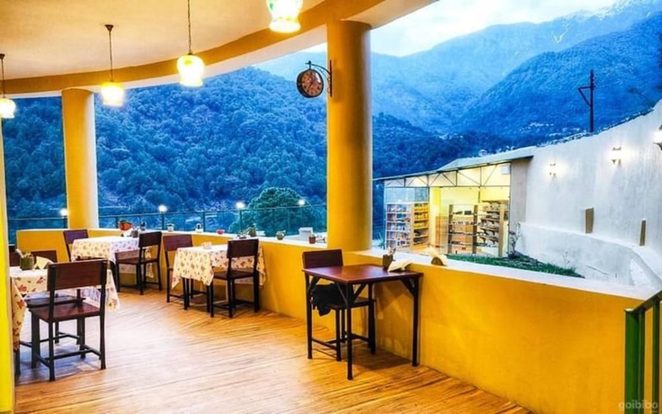 Imagen del bar/restaurante del Hotel goStops Palampur - Hostel. Foto 2