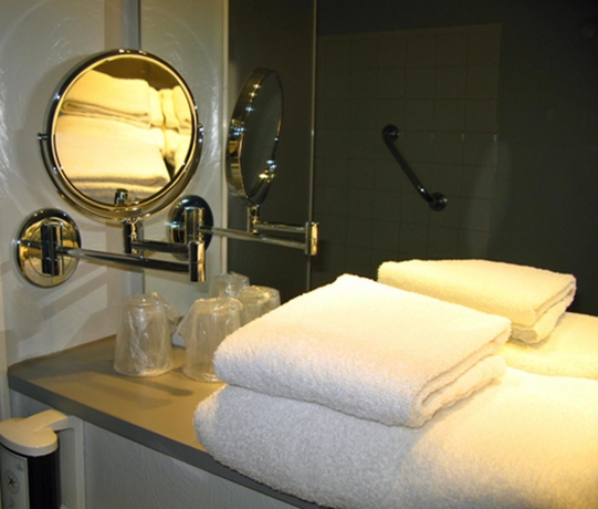 Imagen de la habitación del Hotel greet Hotel Massieux Lyon Nord. Foto 11