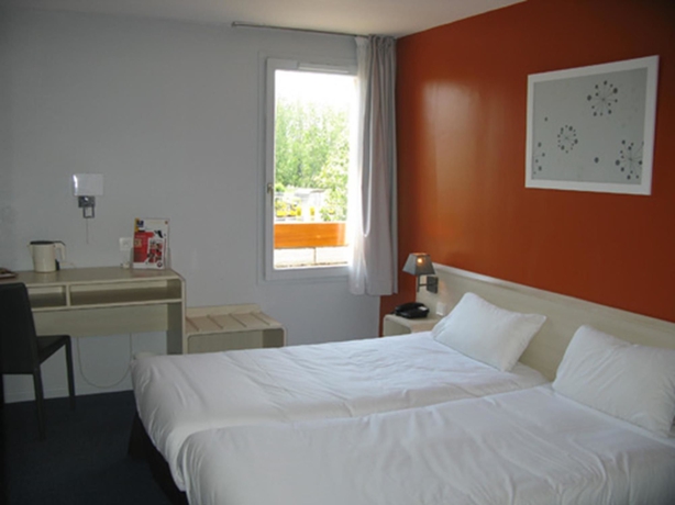 Imagen de la habitación del Hotel greet Hotel Massieux Lyon Nord. Foto 13