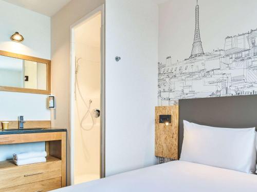 Imagen de la habitación del Hotel greet Hotel Paris Nord 18ème. Foto 17