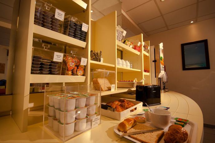 Imagen del bar/restaurante del Hotel greet hotel Montpellier Aeroport Parc des Expos. Foto 6