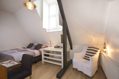 Imagen de la habitación del Hotel het Oude Raadhuis. Foto 11