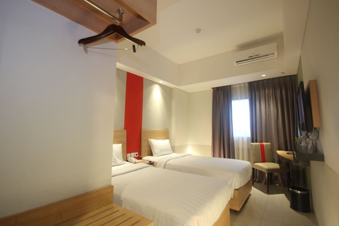 Imagen de la habitación del Hotel @hom Simpang Lima Semarang. Foto 10