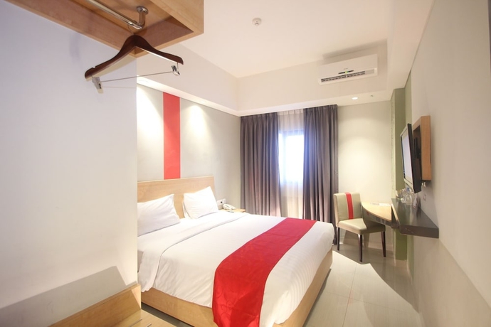 Imagen de la habitación del Hotel @hom Simpang Lima Semarang. Foto 11
