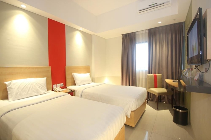 Imagen de la habitación del Hotel @hom Simpang Lima Semarang. Foto 14