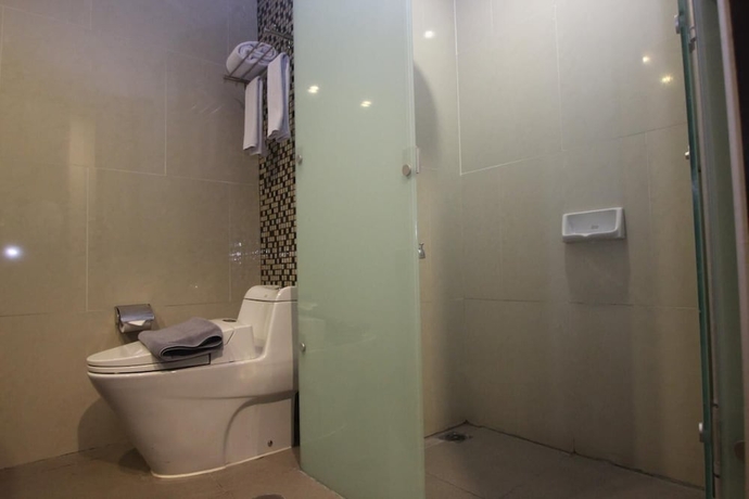 Imagen de la habitación del Hotel @hom Simpang Lima Semarang. Foto 17