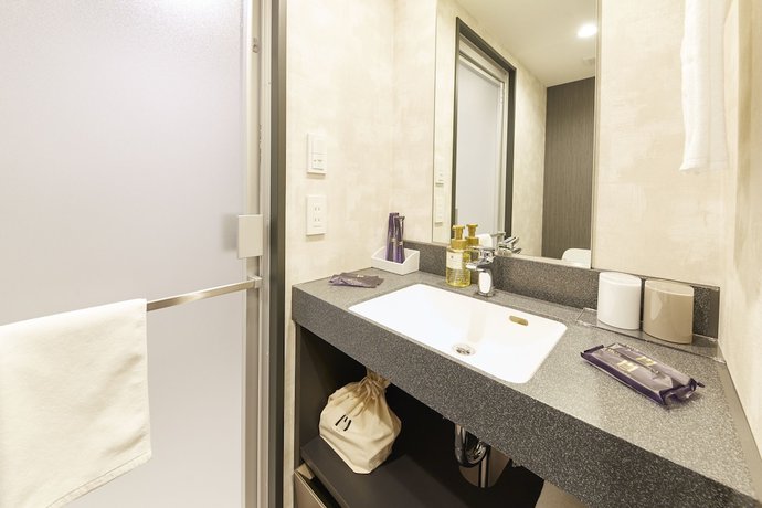 Imagen de la habitación del Hotel hotel MONday Kyoto Marutamachi. Foto 17