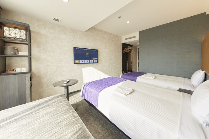 Imagen de la habitación del Hotel hotel MONday Kyoto Marutamachi. Foto 19