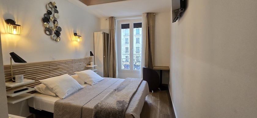 Imagen de la habitación del Hotel hotel camelia. Foto 4