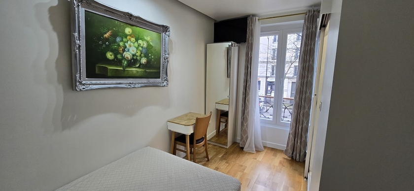 Imagen de la habitación del Hotel hotel camelia. Foto 13