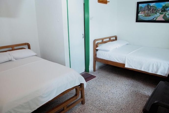 Imagen de la habitación del Hotel hotel casa verde Guatap&eacute;. Foto 5