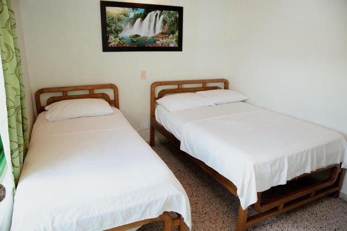 Imagen de la habitación del Hotel hotel casa verde Guatap&eacute;. Foto 6
