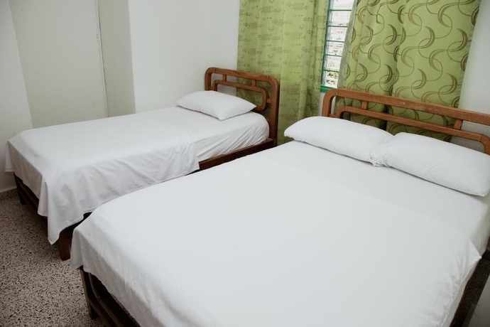 Imagen de la habitación del Hotel hotel casa verde Guatap&eacute;. Foto 9