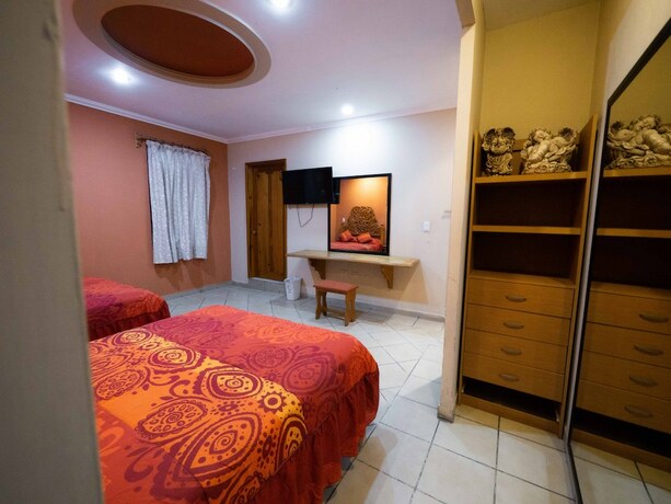 Imagen de la habitación del Hotel hotel el angel taxco. Foto 14