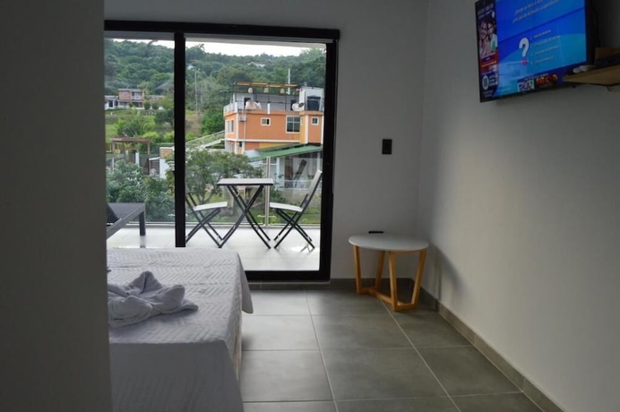 Imagen de la habitación del Hotel hotel guacamayas resort vacation. Foto 9