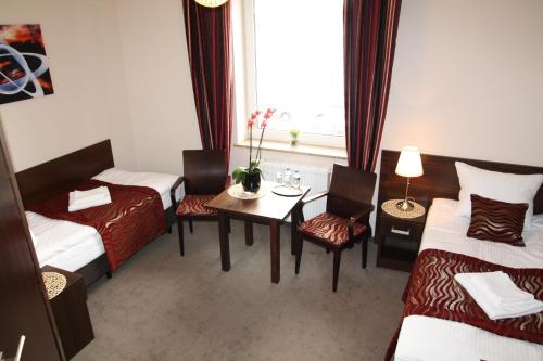 Imagen de la habitación del Hotel hotel kosmonauty wrocław-airport. Foto 6