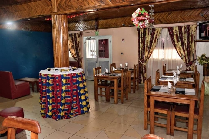 Imagen del bar/restaurante del Hotel hotel le printemps, Douala. Foto 4