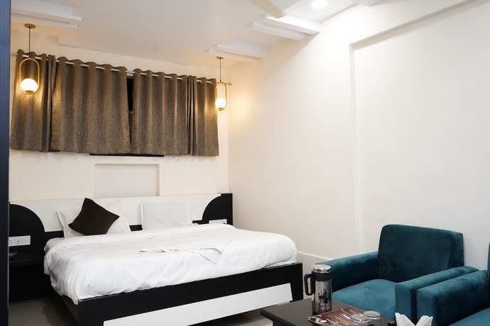 Imagen de la habitación del Hotel hotel mahamaya. Foto 7