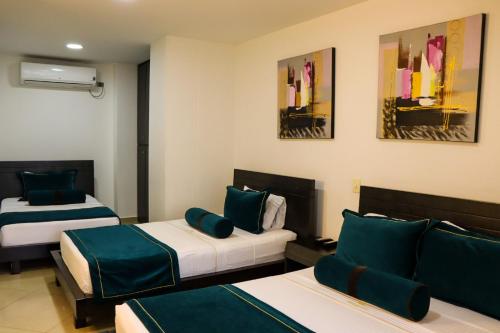 Imagen de la habitación del Hotel hotel medellin gold. Foto 18