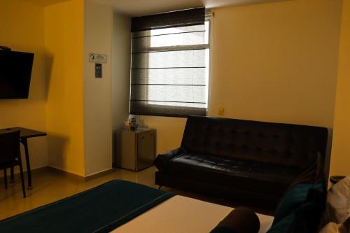 Imagen de la habitación del Hotel hotel medellin gold. Foto 19
