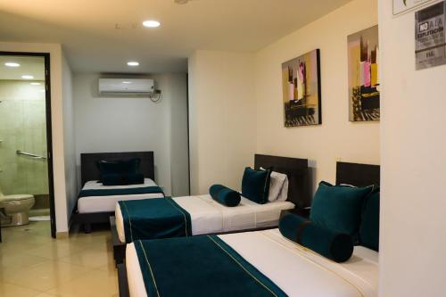 Imagen de la habitación del Hotel hotel medellin gold. Foto 20