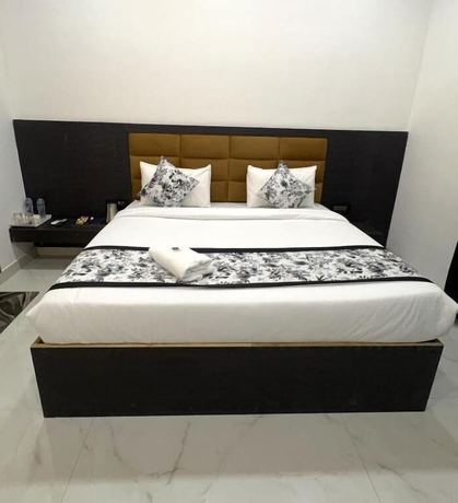 Imagen de la habitación del Hotel hotel pearl nest palace. Foto 2
