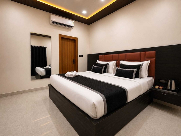 Imagen de la habitación del Hotel hotel pearl nest palace. Foto 5