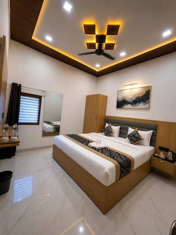 Imagen de la habitación del Hotel hotel pearl nest palace. Foto 6