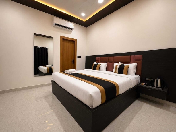Imagen de la habitación del Hotel hotel pearl nest palace. Foto 8
