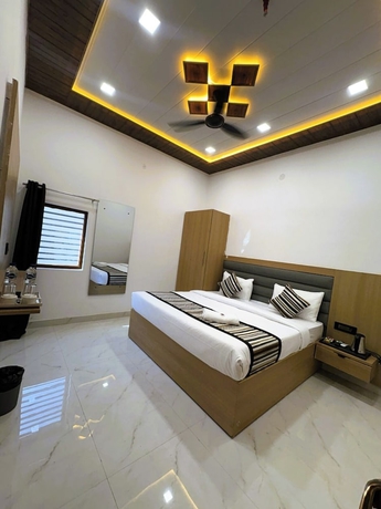 Imagen de la habitación del Hotel hotel pearl nest palace. Foto 11