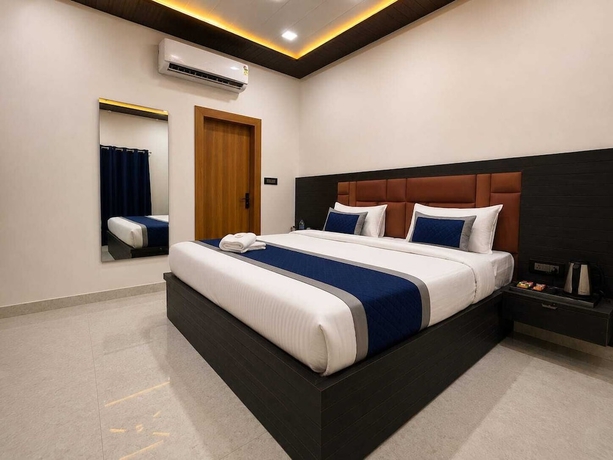 Imagen de la habitación del Hotel hotel pearl nest palace. Foto 13