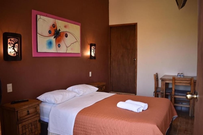 Imagen de la habitación del Hotel hotel y caba&ntilde;as quinta los cipreses. Foto 8