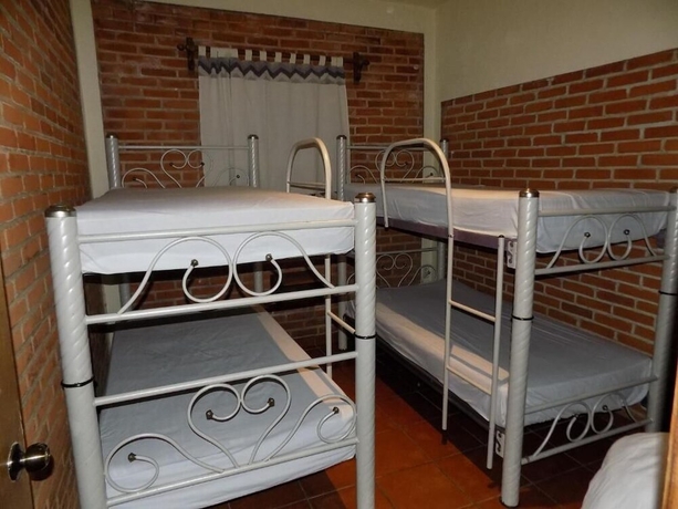 Imagen de la habitación del Hotel hotel y caba&ntilde;as quinta los cipreses. Foto 10