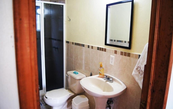 Imagen de la habitación del Hotel hotel y caba&ntilde;as quinta los cipreses. Foto 13