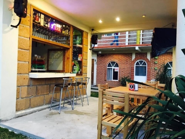 Imagen del bar/restaurante del Hotel hotel y caba&ntilde;as quinta los cipreses. Foto 6