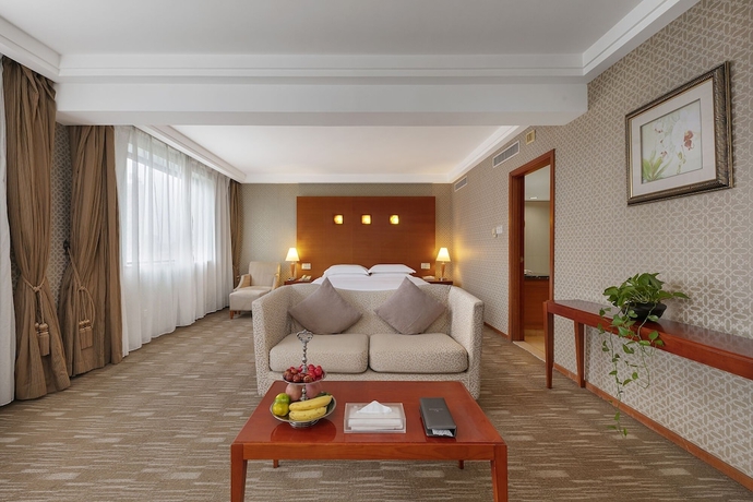 Imagen de la habitación del Hotel huayang plaza hotel. Foto 16