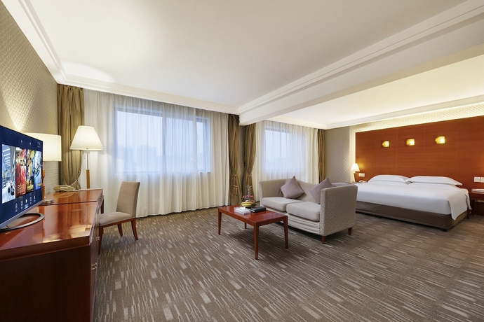 Imagen de la habitación del Hotel huayang plaza hotel. Foto 17