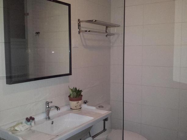 Imagen de la habitación del Hotel i Garden Hotel. Foto 4