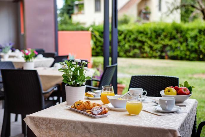 Imagen del bar/restaurante del Hotel iH Hotels Firenze Business. Foto 3