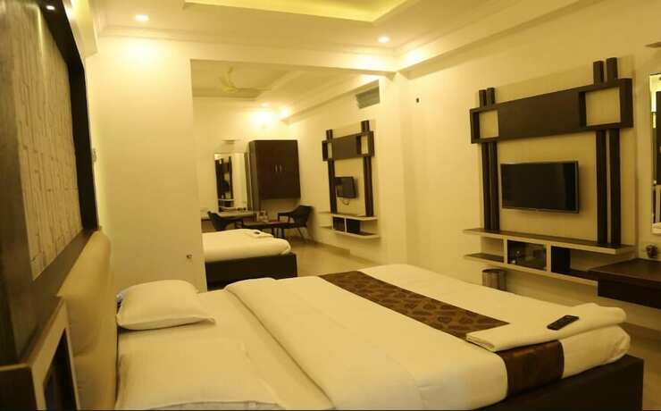 Imagen de la habitación del Hotel i-Roomz Shivananda. Foto 17