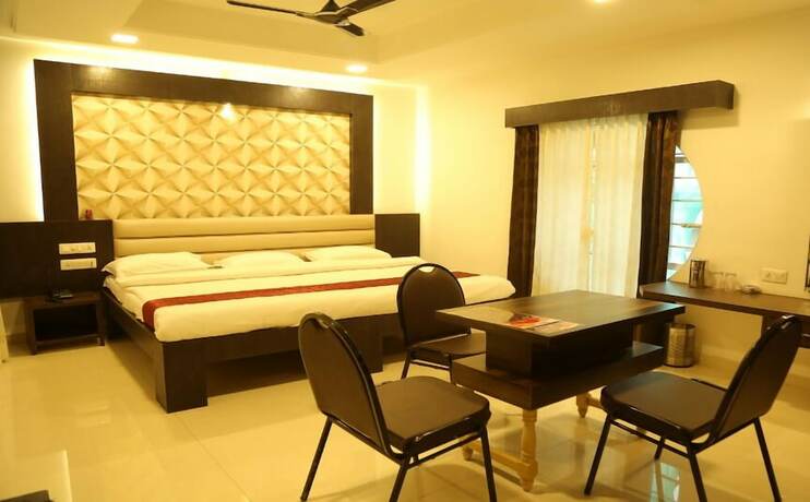 Imagen de la habitación del Hotel i-Roomz Shivananda. Foto 18