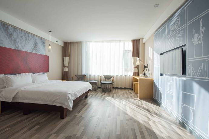 Imagen de la habitación del Hotel ibis Daqing Haofang. Foto 5