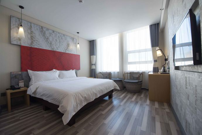 Imagen de la habitación del Hotel ibis Daqing Haofang. Foto 6