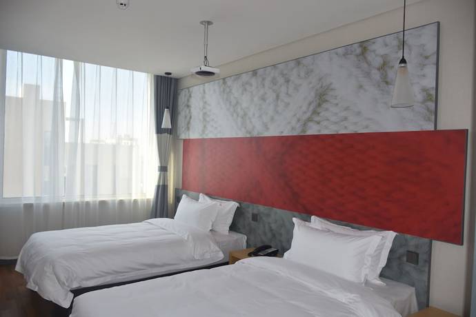 Imagen de la habitación del Hotel ibis Daqing Haofang. Foto 7