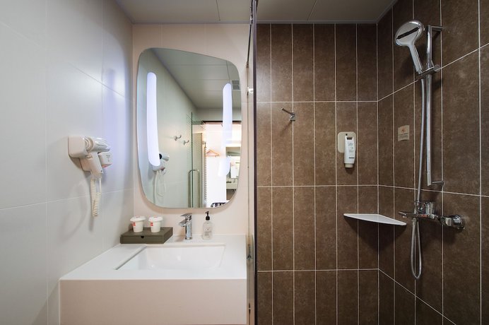 Imagen de la habitación del Hotel ibis Harbin Central Street. Foto 6