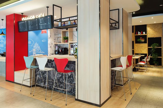 Imagen del bar/restaurante del Hotel ibis Harbin Central Street. Foto 2