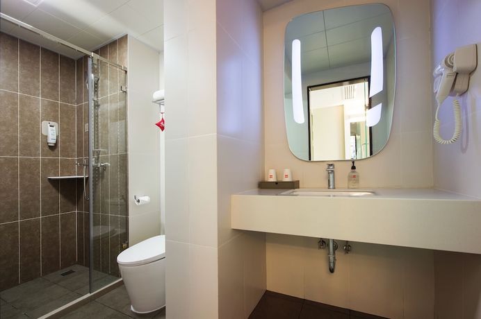 Imagen de la habitación del Hotel ibis Harbin Central Street. Foto 11