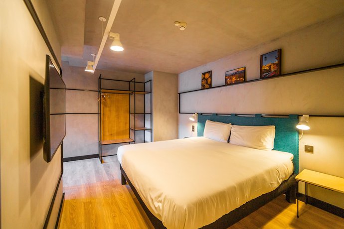 Imagen de la habitación del Hotel ibis Porto Centro Mercado Bolhao. Foto 16