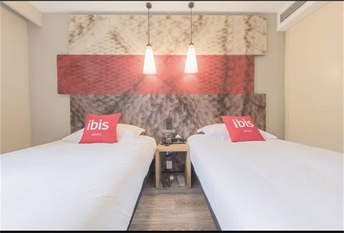 Imagen del bar/restaurante del Hotel ibis Qingdao Hi-Tech Zone Hotel. Foto 3