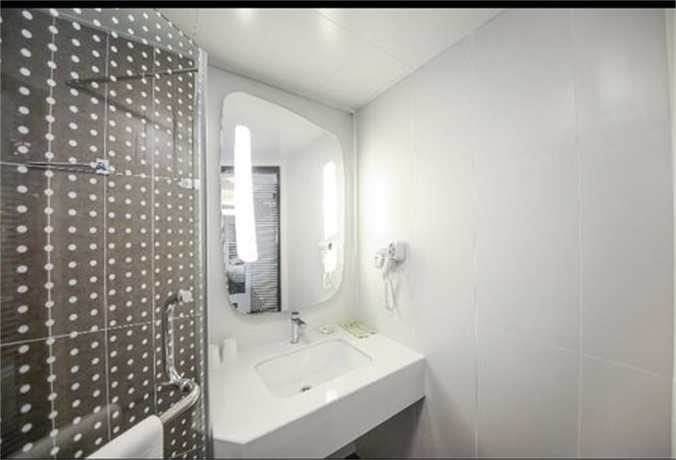 Imagen de la habitación del Hotel ibis Qingdao Hi-Tech Zone Hotel. Foto 7